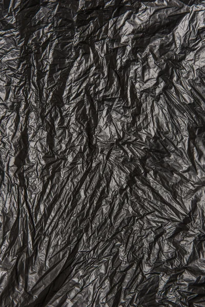 Sfondo di superficie di plastica strutturata nera — Foto Stock