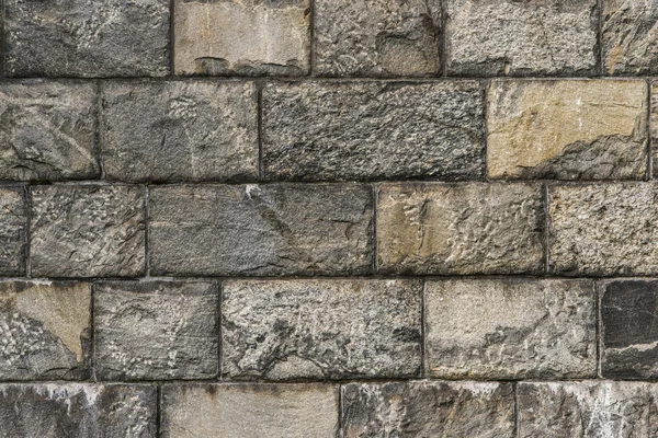 Solid stone block wall — Stock Photo, Image