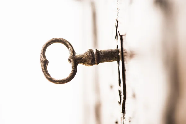 Vintage key in lock of wooden chest — Stock Photo, Image