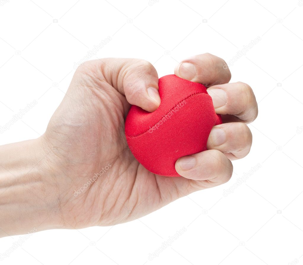 Hand squeezing red ball