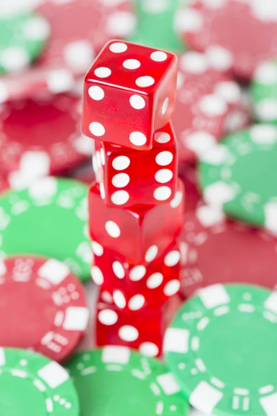 Poker chips and red casino dice — Stock Photo, Image