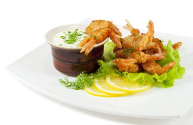 Fried prawns in coconut breading with dipping sauce