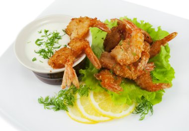 Fried prawns in coconut breading with dipping sauce
