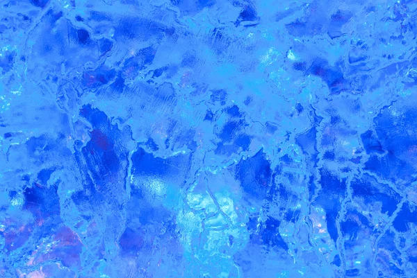Texture of ice with blue back light. — Stock Photo, Image