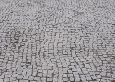arka plan olarak granit taşlar tarafından Arnavut kaldırımlı sokakta