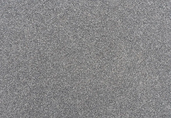 Decoratieve bekleding van een granieten kruimel als achtergrond — Stockfoto