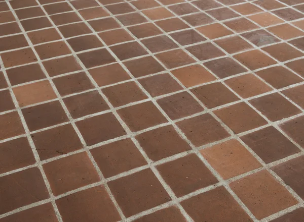 Старый пол из керамических плит — стоковое фото