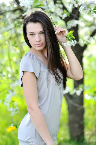 Beautiful healthy young woman on nature — Stock Photo, Image