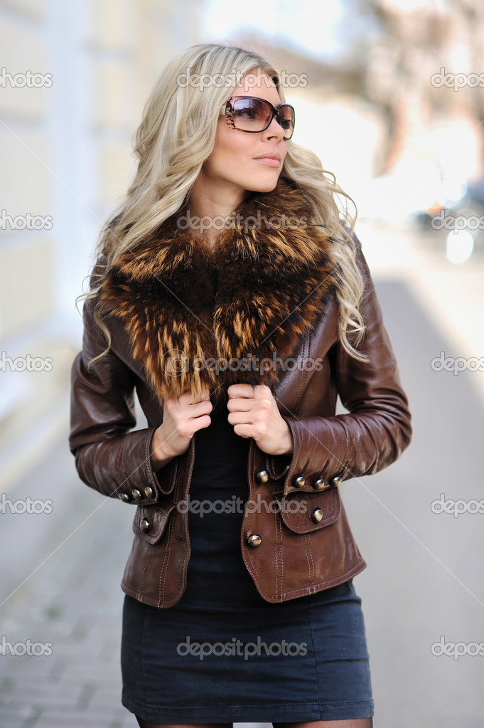 Young fashionable beautiful woman portrait - outdoors