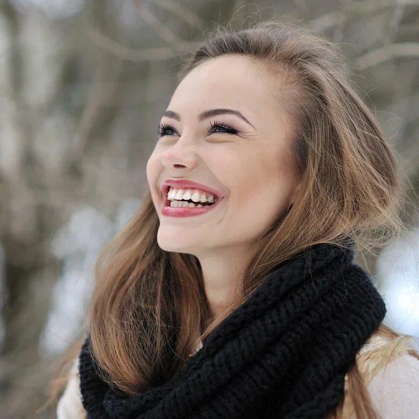 Young beautiful laughing girl in winter - close up — Stock Photo, Image