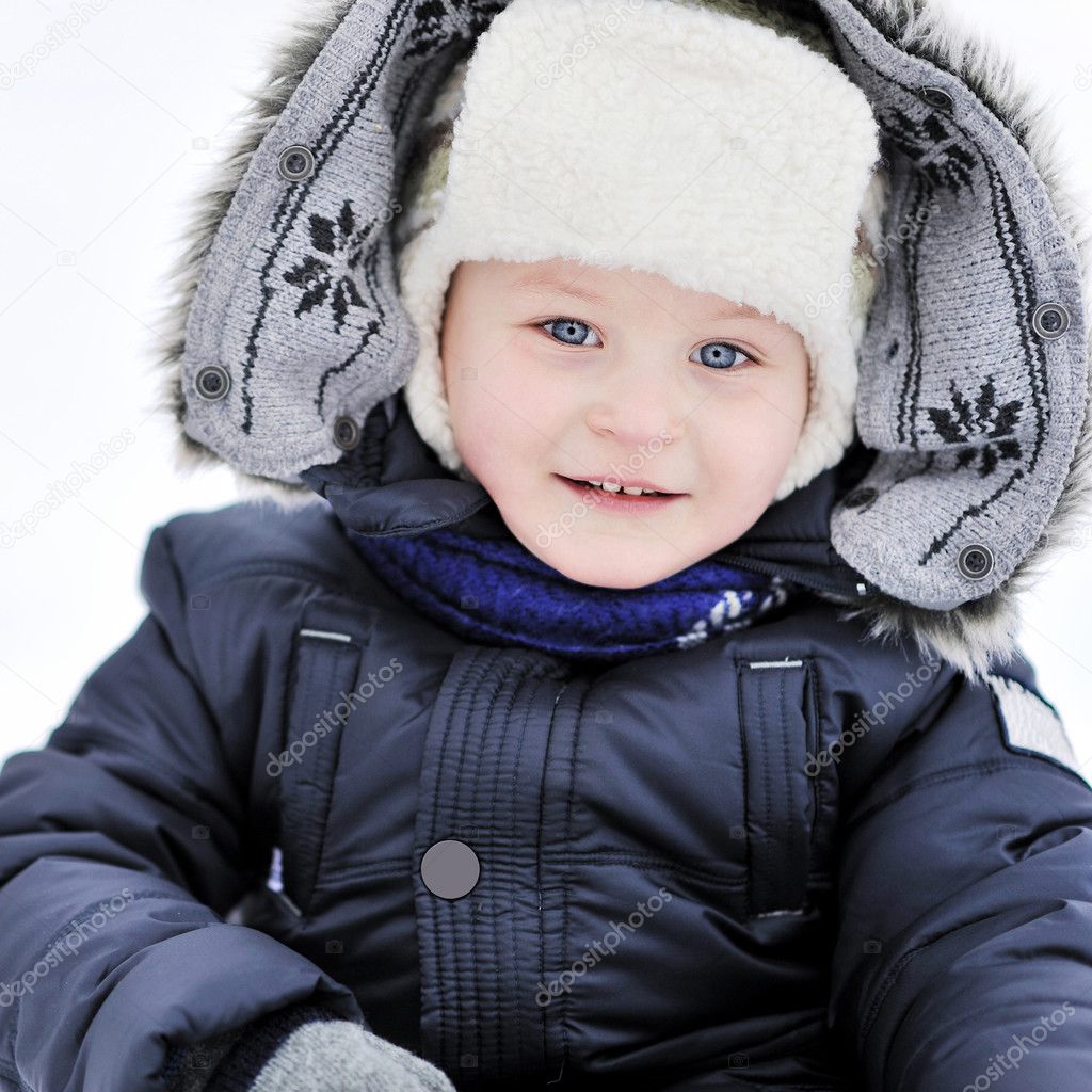 Cute little boy portrait in winter