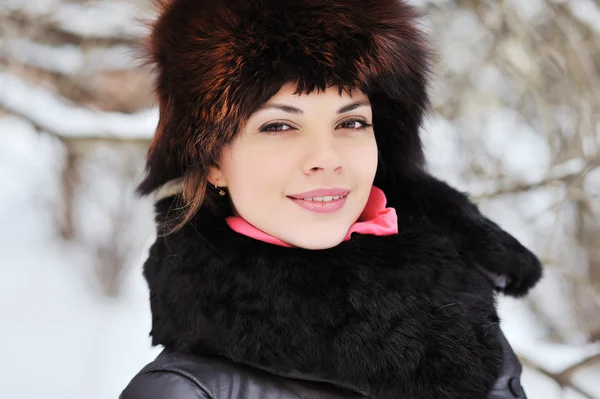 Outdoor fashion portrait of pretty young girl in winter — Stock Photo, Image