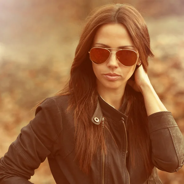 Closeup of a beautiful female in sunglasses — Stock Photo, Image