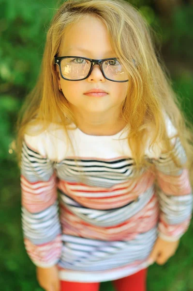 Sweet little girl wearing glasses - outdoor — Stock Photo, Image