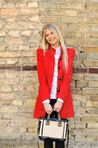 Outdoor portrait of beautiful stylish girl with handbag — Stock Photo, Image