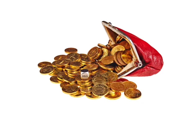 Scattered gold coins are in red purse and dice with word Sell — Stock Photo, Image