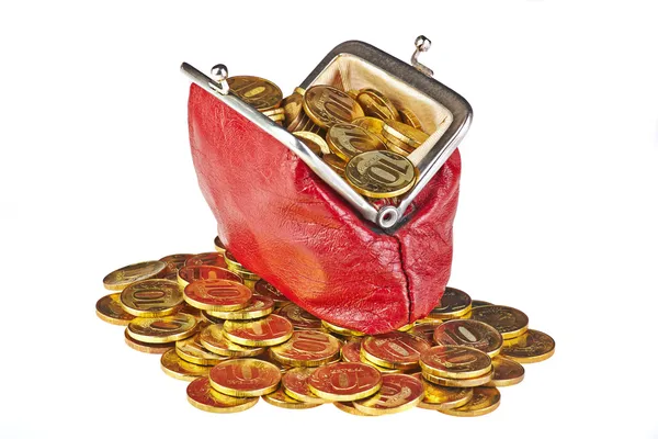 Old red purse and golden coins. — Stock Photo, Image