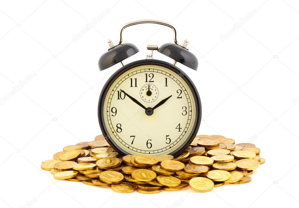 Beautiful old clock staying on one golden coins. Time is money c