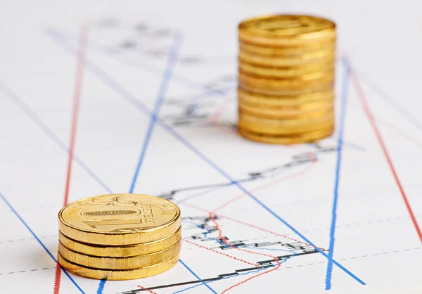 Financial chart, rising stacks of golden coins — Stock Photo, Image