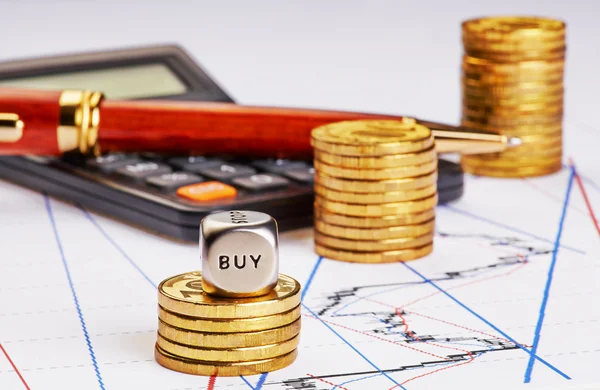 Dices cube with word BUY, stack of coins, calculator, and the p — Stock Photo, Image