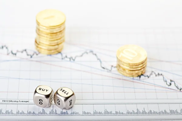 Downtrend stacks of coins and dices cubes with the words SELL BU — Stock Photo, Image