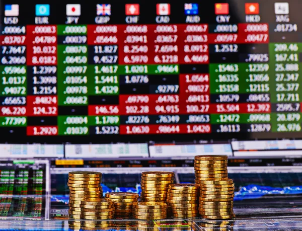 Stacks of golden coins and the financial chart as background. Se — Stock Photo, Image