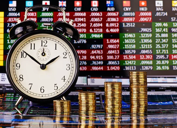 Uptrend stacks of golden coins, clock and financial chart as bac — Stock Photo, Image