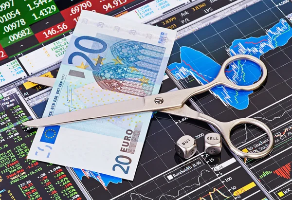 Scissors cutting euro banknote, dices cubes with the words SEL — Stock Photo, Image