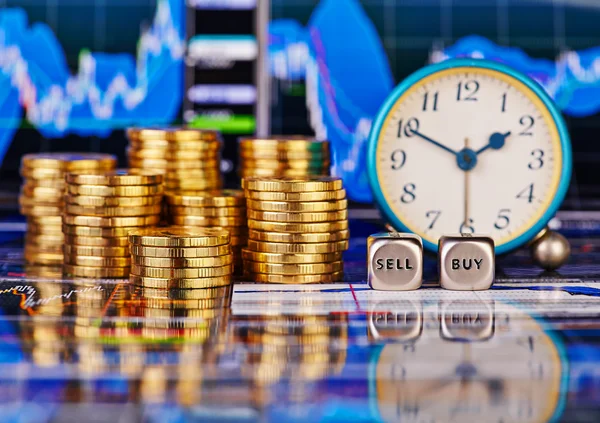 Stacks of golden coins, clock, dices cubes with the words SELL B — Stock Photo, Image