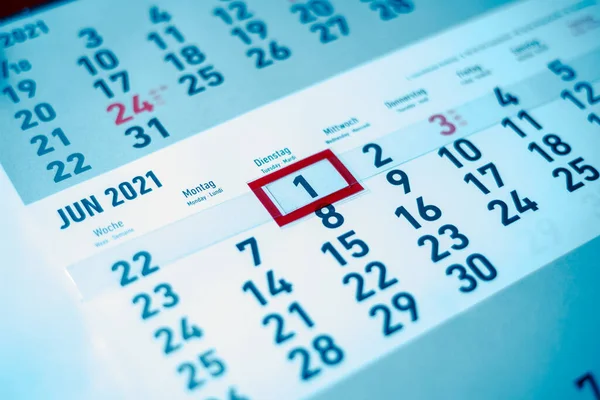 First day of month in calendar. Marked red. This day will pass, sooner or later. Here in the office and elsewhere. New money, new paycheck. 30 more days to go. Business as usual. Working, coffee break, meeting, lunch break, work.