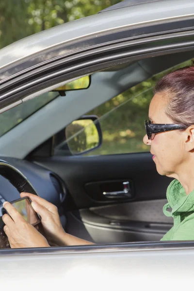 Friendly woman using tablet phone — Stock Photo, Image