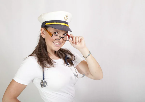 Smiling female cruiser doctor with stethoscope — Stock Photo, Image