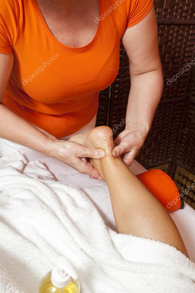 Woman receiving a professional massage and lymphatic drainage