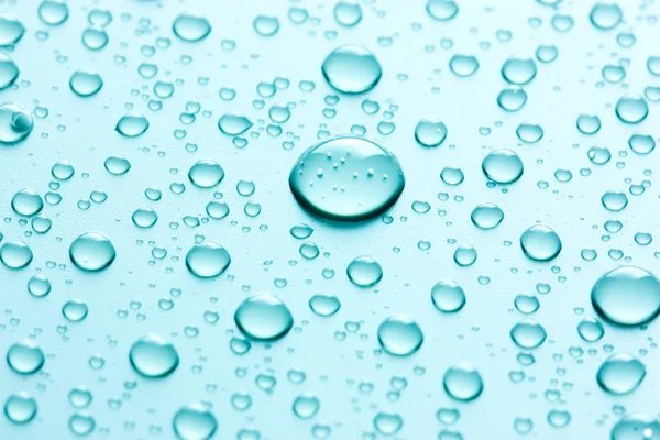 Gotas de água em azul — Fotografia de Stock