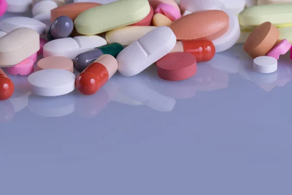 Colored pills, tablets and capsules — Stock Photo, Image