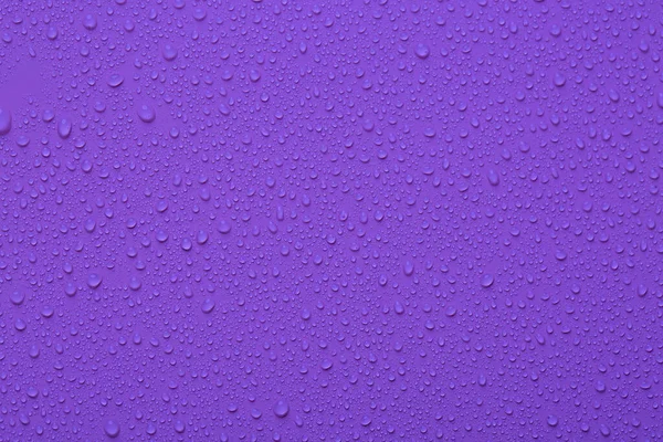 Water Druppels Paarse Kleur Oppervlak — Stockfoto
