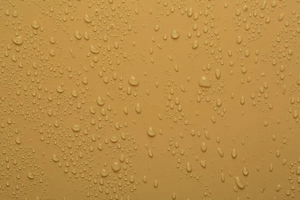 Vatten Droppar Orange Färg Yta — Stockfoto