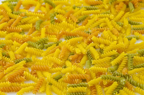 Fusilli Pasta texture background — Stock Photo, Image
