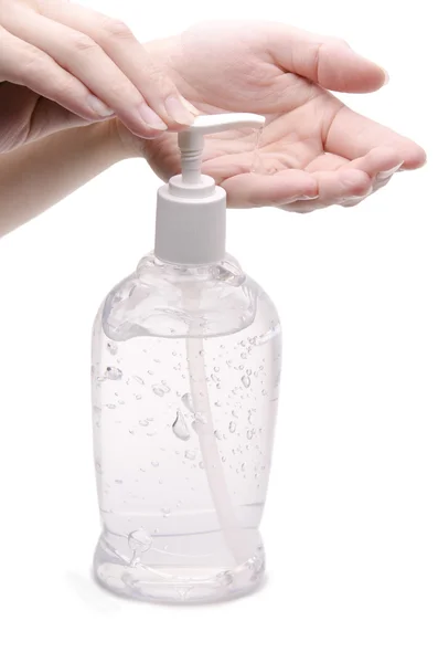 Hands and sanitizer dispenser — Stock Photo, Image