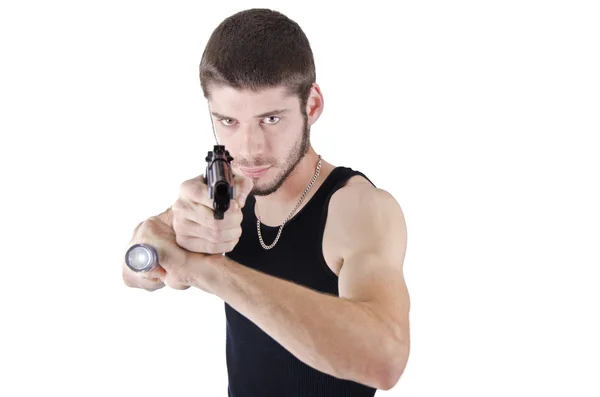 Joven apuntando con pistola —  Fotos de Stock