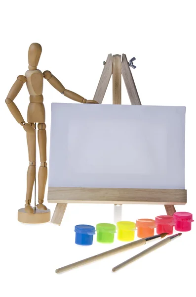 Canvas,brushes and easel — Stock Photo, Image