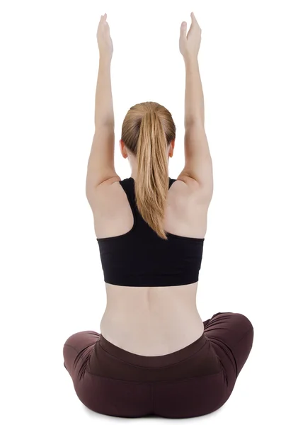 Zittende vrouw doet zich het uitrekken — Stockfoto