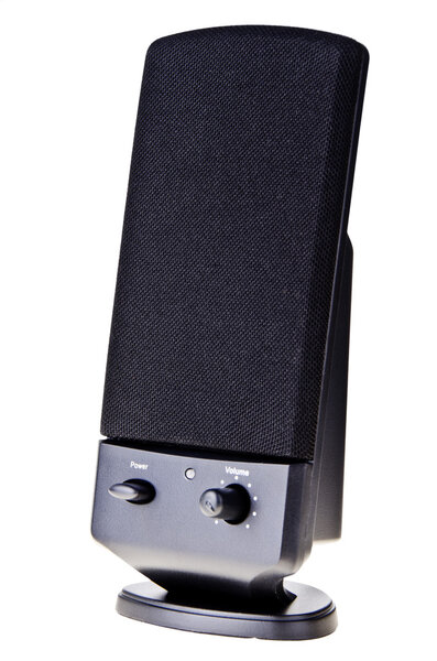 Black computer speaker, isolated on white background.
