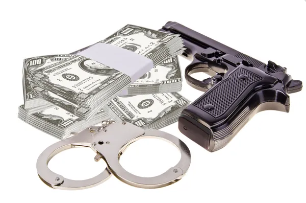 Gun and money — Stock Photo, Image