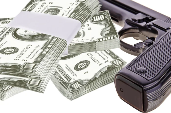 Gun and money — Stock Photo, Image