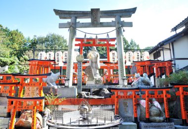 Statue of Goddess at Fushimi Inari Shrine in Kyoto clipart