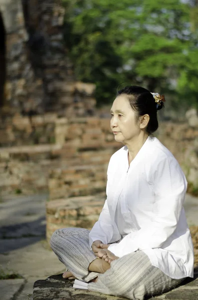 Asian woman meditating yoga — Stock Photo, Image
