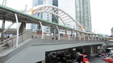 Public sky walk for transit between Sky Transit and Bus Rapid Transit Systems at Sathorn-Narathiwas junction