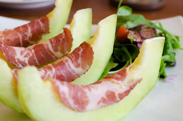 Italian appetizer, ham with melon — Stock Photo, Image
