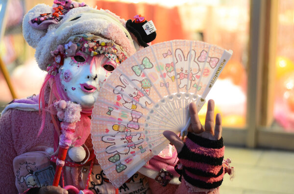 TOKYO - CIRCA NOV 24: Unidentified Japanese girl in Cosplay outfit poses for photo in Harajuku